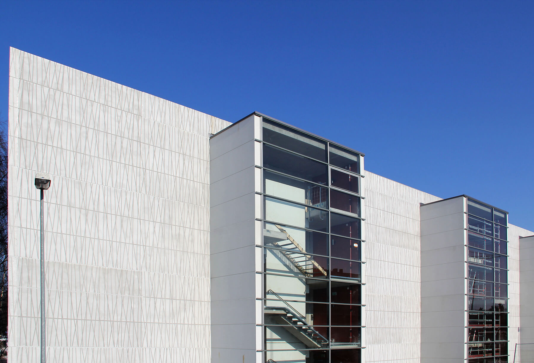 Bishop's Courtyard Parking House